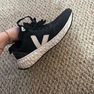 Veja running shoes. Size 9. Overall in good condition.two small spots on top.